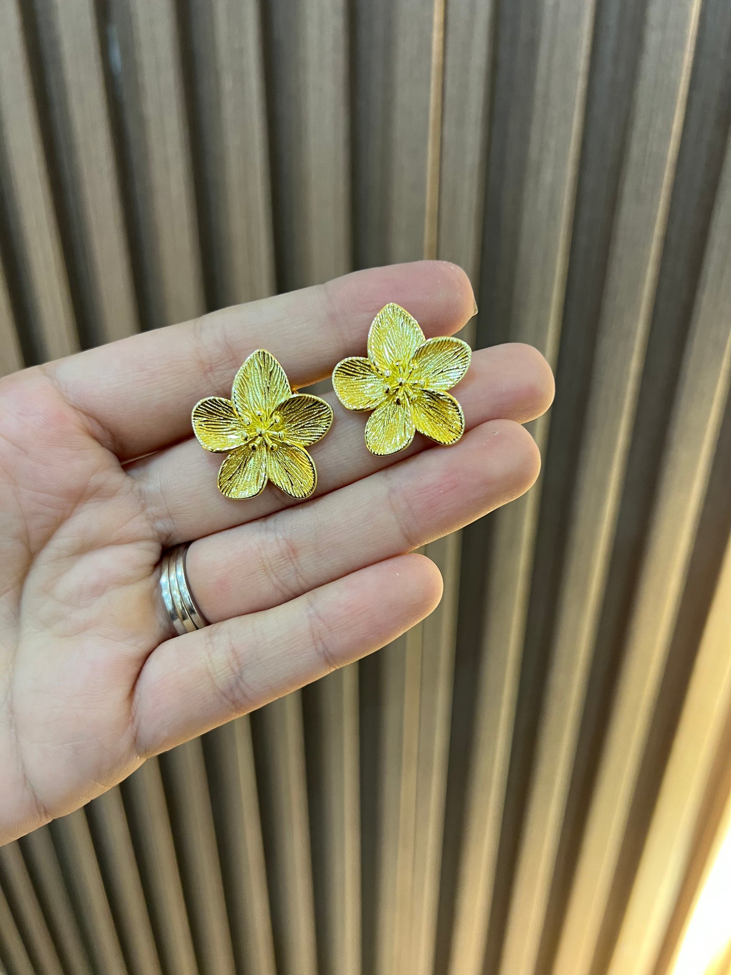 arete topo flor rodio