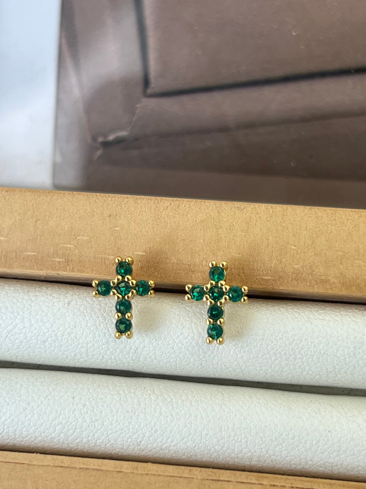 Topo cruz esmeralda