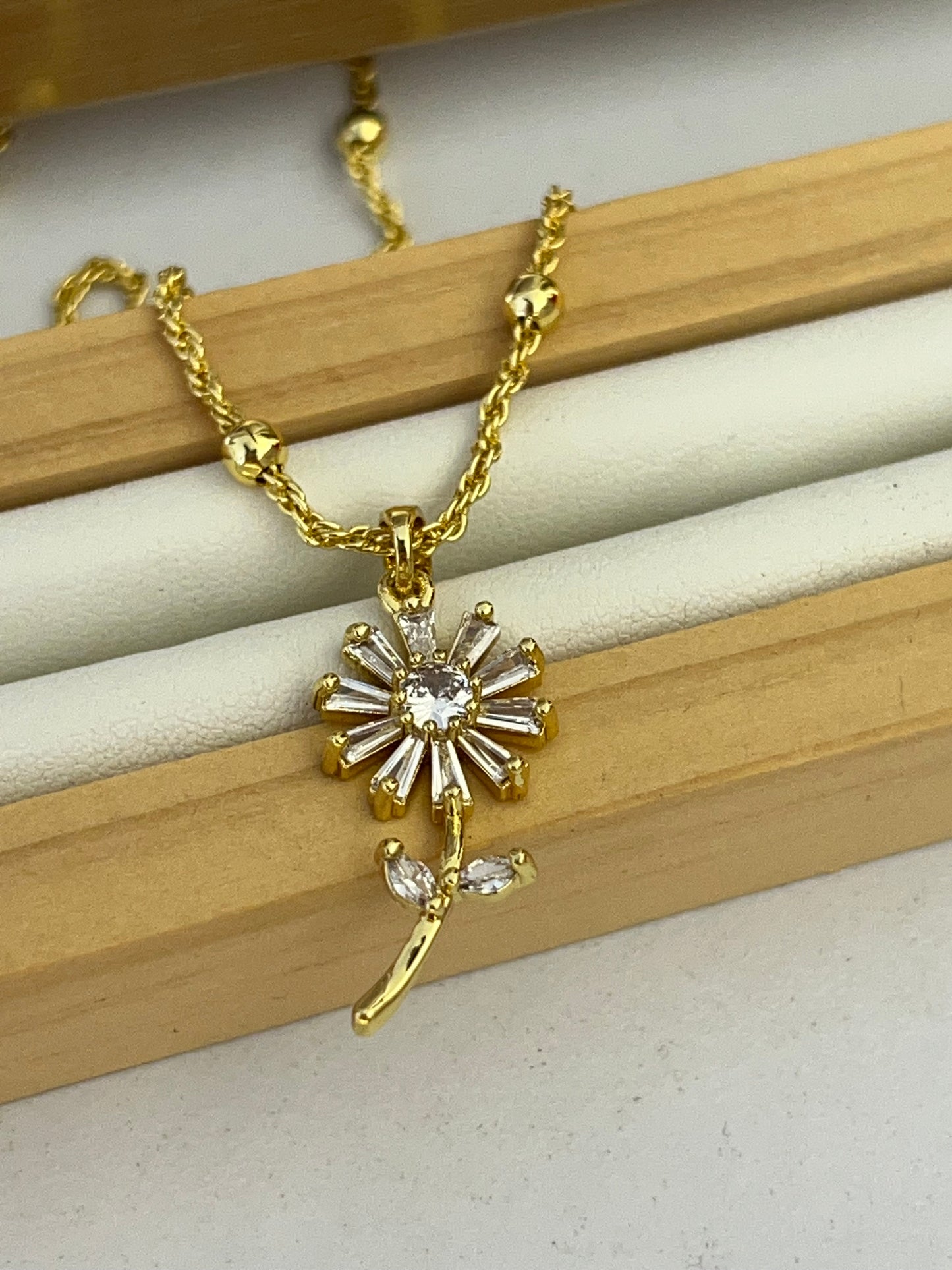 Cadena rodio girasol diamante